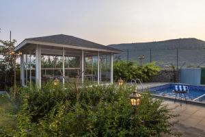 ELIVAAS Nimishka 5 BHK Villa with Pvt Pool, Garden & Scenic Views