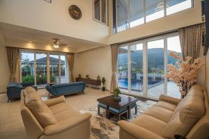 ELIVAAS Nimishka 5 BHK Villa with Pvt Pool, Garden & Scenic Views