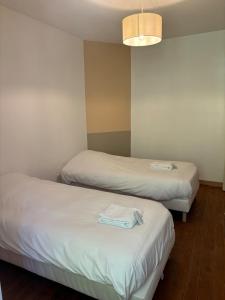 Appartements Au Tulipier, appartement 120m2, de 2 a 9 personnes : photos des chambres