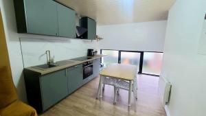 Appartements L&A Home and Spa, baignoire jacuzzi : photos des chambres