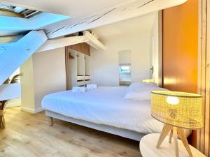 Appartements L-Elegance Montoise - Plein Centre - Tout Confort : photos des chambres