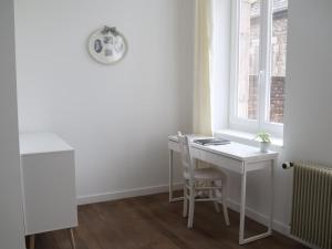 Appartements Escapade Givetoise : photos des chambres