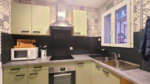 Appartements La Maison d -Isa Meze appartement RdC : photos des chambres