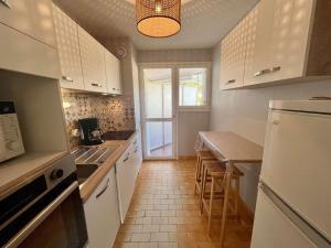 Appartements Appartement 4 pieces avec parking, proche plage a Cavalaire - FR-1-226B-182 : photos des chambres