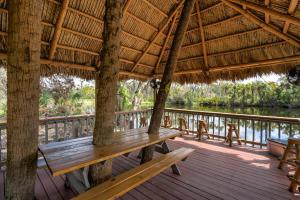 Riverside Oasis Home w Tiki Hut & Firepit