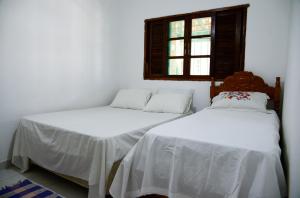 Casa perto das principais praias c WiFi e churrasq