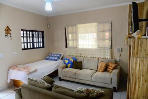 Casa perto das principais praias c WiFi e churrasq