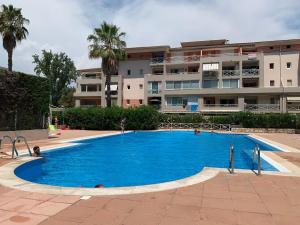 Appartements T2 Proche Polygone - piscine, parking prive, fibre : photos des chambres