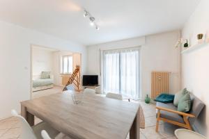 Appartements Chez Margaux - Parking : photos des chambres