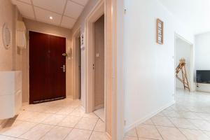 Appartements Chez Margaux - Parking : photos des chambres