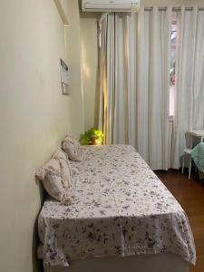 Quarto atrás do Copacabana Palace 3 pessoas