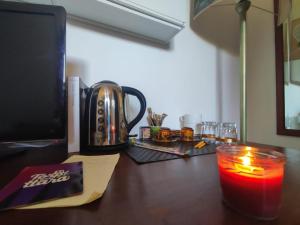 Parrot Room - Camera a Roma con bagno privato