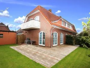 Holiday home in Dornum with garden - Utarp