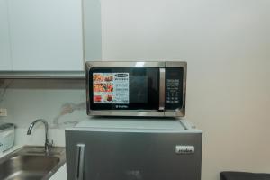 The Quirk Inn Air residence Makati Swim Gym Park Eat Laugh 3301