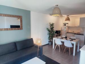 Appartements L'Olivier - Piscine et climatisation : photos des chambres