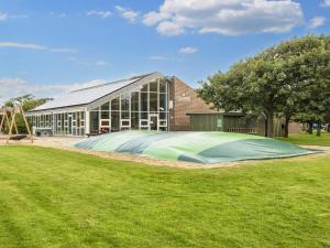 4 person holiday home on a holiday park in Hemmet