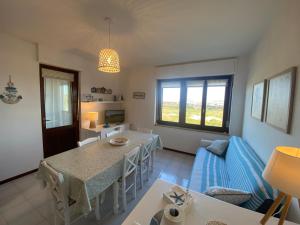 Casa con giardino, Wi-Fi e aria condizionata vicino alla Pelosa