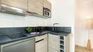 Appartements HOMEY TITI - Hyper-centre - Proche Gare et Tram - Lit Convertible - Wifi gratuit : photos des chambres