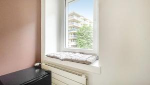 Maisons d'hotes LA COLOC CHOCO - Belle Colocation en hypercentre / 5 chambres privees / Salle de bains privative / Proche Gare et Tram / Wifi et Netflix : photos des chambres