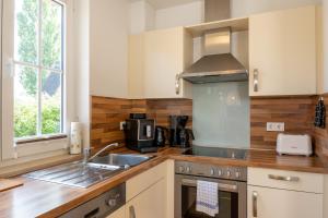 C 5 Premium Reethaus Delphin mit eigenem Whirlpool und Außensauna