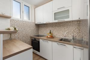 Petrovic Family - Two Bedroom Apartment