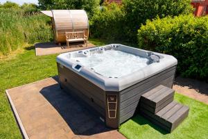 C 7 Premium Reethaus Marvin mit eigenem Whirlpool und Sauna