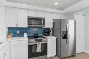 New Ownership. Beachfront. Renovated. Relax, Recharge, Unwind