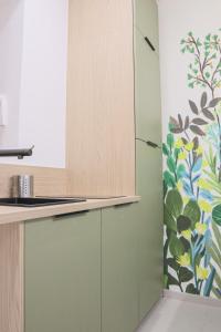 Appartements Jardin enchante, city center : photos des chambres