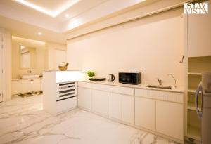 StayVista at Sabora Blue - Luxury 4 BHK Near Airport, Malviya Nagar, Jaipur