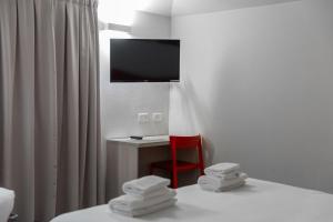 Chambre Triple avec Salle de Bains Privative