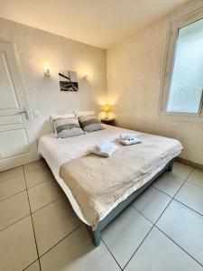 Appartements La Cotiere, Terrasse et Jardin RDC, Proche plage : photos des chambres