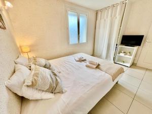 Appartements La Cotiere, Terrasse et Jardin RDC, Proche plage : photos des chambres