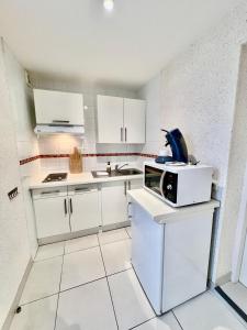 Appartements La Cotiere, Terrasse et Jardin RDC, Proche plage : photos des chambres
