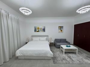 England Cluster International City - Bright,Spacious and Well Furnished Studio