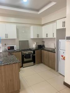 Luxurious one bedroom Apartment, Kilimani-Nairobi Kenya by Sana Sana Holiday Apartments