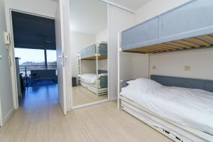 De Zandroos - zicht op duinen en zee