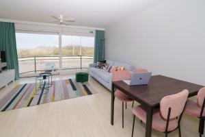 De Zandroos - zicht op duinen en zee