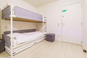 De Zandroos - zicht op duinen en zee