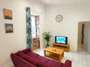 Appartements Joli appartement Urbain : photos des chambres