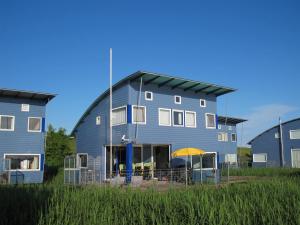 Ferienhaus SEABIRD by FeWo-PLAN OOST150 mit direktem Zugang ins LAUWERSMEER