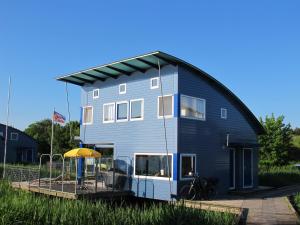 Ferienhaus SEABIRD by FeWo-PLAN OOST150 mit direktem Zugang ins LAUWERSMEER