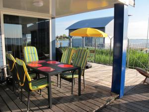 Ferienhaus SEABIRD by FeWo-PLAN OOST150 mit direktem Zugang ins LAUWERSMEER