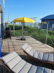 Ferienhaus SEABIRD by FeWo-PLAN OOST150 mit direktem Zugang ins LAUWERSMEER