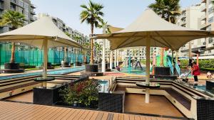 Lawnz Luxury furnished studio with Balcony Swimming Pool Gym Kids play ground