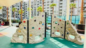 Lawnz Luxury furnished studio with Balcony Swimming Pool Gym Kids play ground