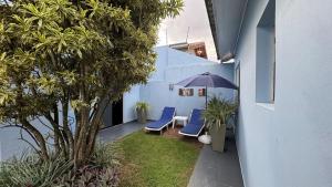 Conforto e Diversão para Toda a Família 50m da Praia - churrasqueira - Sinuca - Jardim - vista lateral para o mar