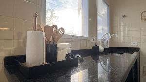 Conforto e Diversão para Toda a Família 50m da Praia - churrasqueira - Sinuca - Jardim - vista lateral para o mar