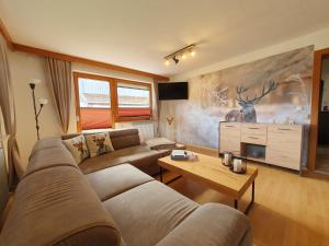 LECHUFER, 80m2, Haushälfte mit privatem Eingang, Kaminofen, Terrasse, Garten