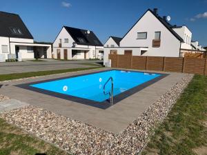 Ferienhaus Lilja mit Garten, Kamin und Pool
