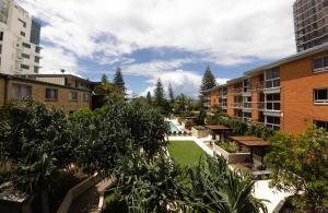 Beach front luxury with two carparks, pool, gym